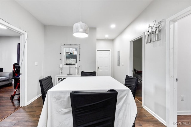 1201 W Broadway, Hopewell, VA 23860 - dining area featuring electric panel, dark wood-style flooring, recessed lighting, and baseboards