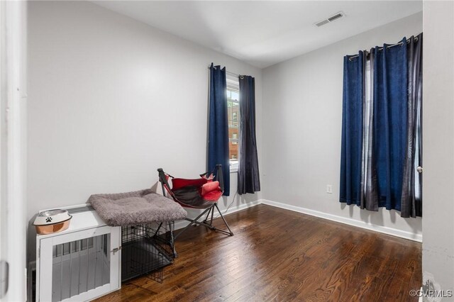 1201 W Broadway, Hopewell, VA 23860 - sitting room with wood finished floors and baseboards