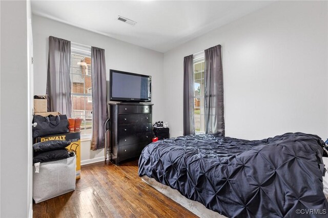1201 W Broadway, Hopewell, VA 23860 - bedroom featuring wood finished floors and baseboards