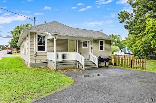 1201 W Broadway, Hopewell, VA 23860 - bungalow-style home with a porch and a shingled roof