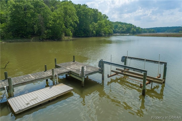 319 Parrotts Cove Rd, Water View, VA 23180 - dock area featuring a water view, boat lift, and a forest view