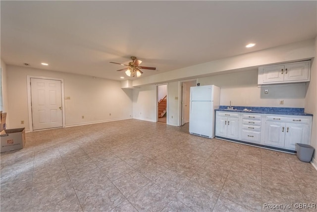 319 Parrotts Cove Rd, Water View, VA 23180 - kitchen featuring freestanding refrigerator, recessed lighting, dark countertops, a ceiling fan, and white cabinetry