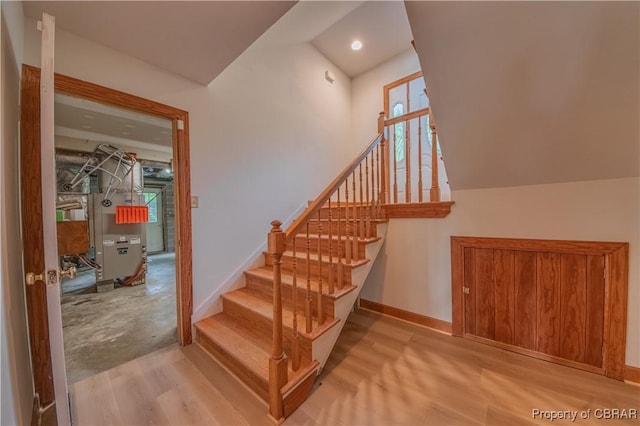 319 Parrotts Cove Rd, Water View, VA 23180 - stairs with wood finished floors, baseboards, lofted ceiling, and recessed lighting