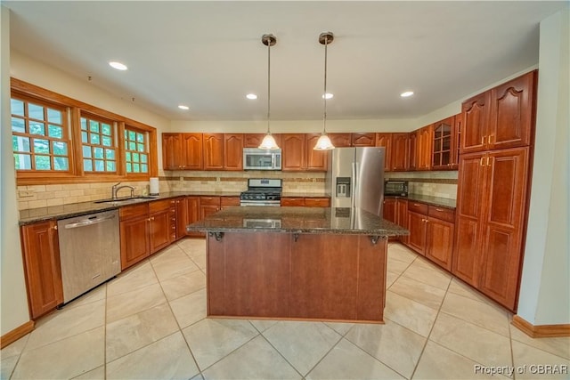 319 Parrotts Cove Rd, Water View, VA 23180 - kitchen featuring appliances with stainless steel finishes, a sink, backsplash, a center island, and recessed lighting