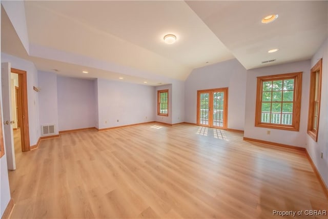 319 Parrotts Cove Rd, Water View, VA 23180 - unfurnished living room with baseboards, light wood-type flooring, recessed lighting, and vaulted ceiling