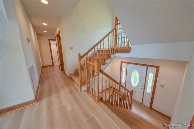 319 Parrotts Cove Rd, Water View, VA 23180 - foyer featuring wood finished floors, recessed lighting, baseboards, and stairway