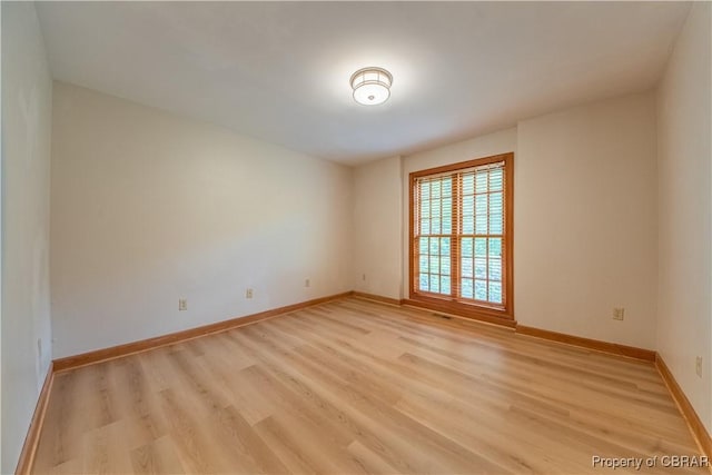 319 Parrotts Cove Rd, Water View, VA 23180 - empty room with light wood-style floors and baseboards