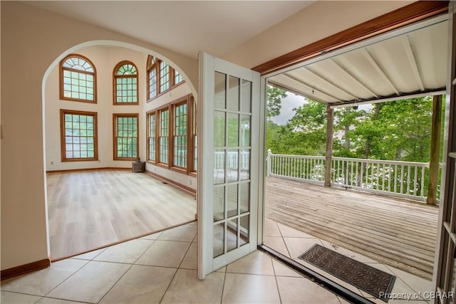 319 Parrotts Cove Rd, Water View, VA 23180 - doorway featuring tile patterned floors and baseboards