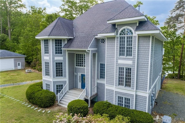 319 Parrotts Cove Rd, Water View, VA 23180 - view of front of house featuring a front yard and roof with shingles