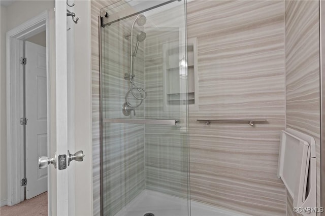 bathroom featuring a stall shower