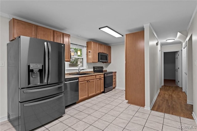 kitchen with refrigerator with ice dispenser, range with electric stovetop, dishwasher, a sink, and ornamental molding