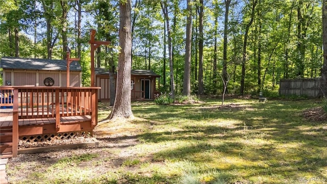 view of yard featuring a wooden deck