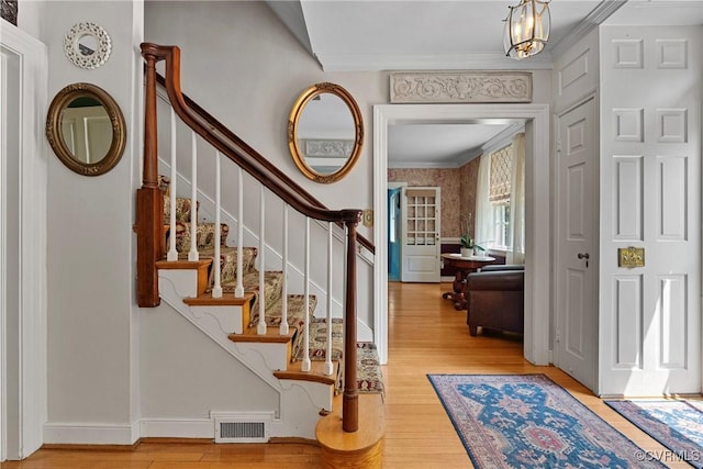 204 College Ave, Ashland, VA 23005 - entryway with crown molding, wood finished floors, and stairway
