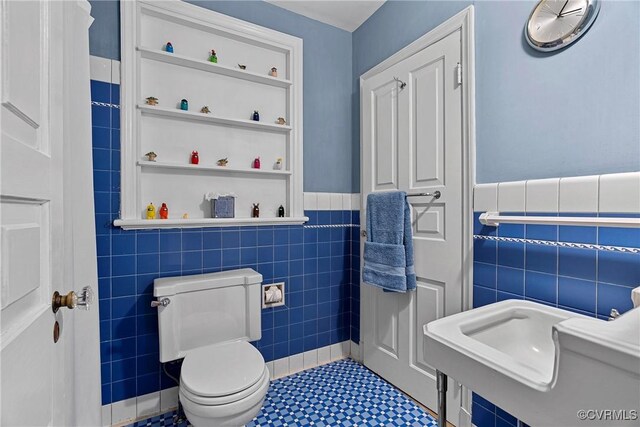 204 College Ave, Ashland, VA 23005 - bathroom with tile walls, wainscoting, and tile patterned flooring