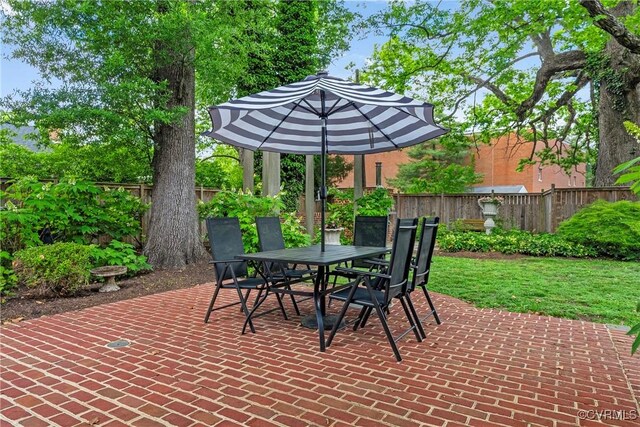 204 College Ave, Ashland, VA 23005 - fenced backyard featuring outdoor dining space and a patio