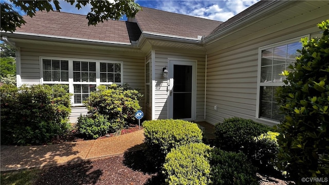 7211 Norwood Pond Ct, Midlothian, VA 23112 - doorway to property featuring roof with shingles
