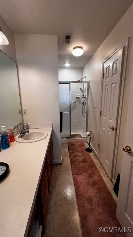 7211 Norwood Pond Ct, Midlothian, VA 23112 - bathroom featuring a shower stall and vanity