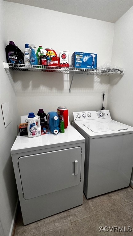 7211 Norwood Pond Ct, Midlothian, VA 23112 - washroom featuring washer and dryer, tile patterned floors, and baseboards