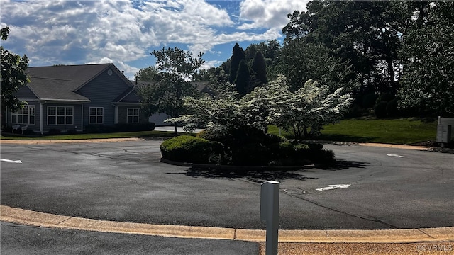 7211 Norwood Pond Ct, Midlothian, VA 23112 - view of asphalt road with curbs