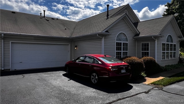 7211 Norwood Pond Ct, Midlothian, VA 23112 - view of side of property featuring asphalt driveway and a garage