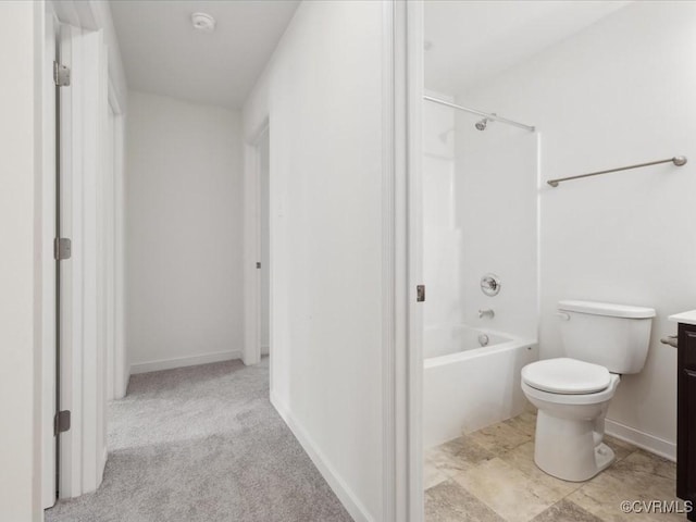 full bath featuring vanity, toilet, tub / shower combination, and baseboards