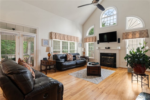 16748 Kipper Turn, Chesterfield, VA 23120 - living room featuring a ceiling fan, high vaulted ceiling, wood finished floors, and a premium fireplace
