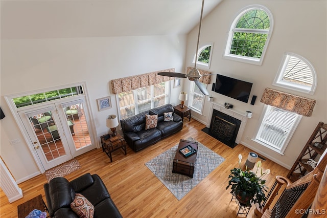 16748 Kipper Turn, Chesterfield, VA 23120 - living room with high vaulted ceiling, wood finished floors, and a fireplace