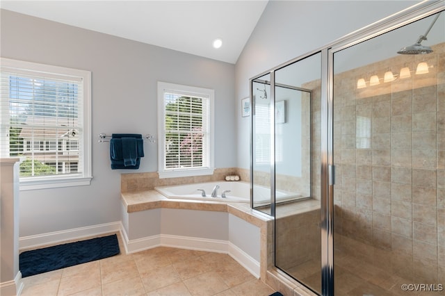 16748 Kipper Turn, Chesterfield, VA 23120 - bathroom featuring lofted ceiling, a bath, a shower stall, and tile patterned floors