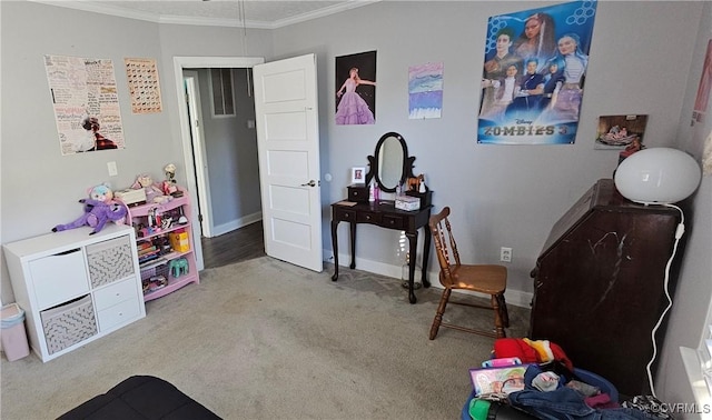 rec room with crown molding, carpet flooring, and baseboards
