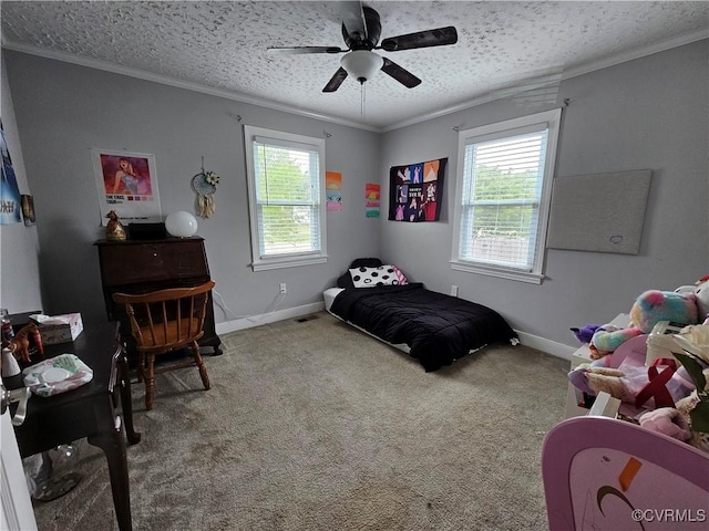 bedroom with multiple windows, ornamental molding, carpet flooring, a textured ceiling, and baseboards