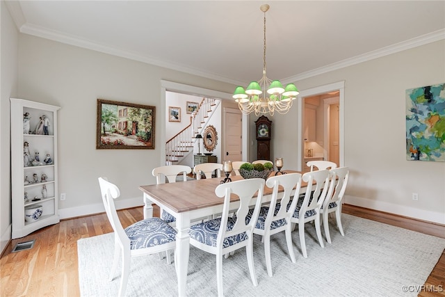 8 Nomas Ln, Henrico, VA 23238 - dining room featuring stairs, ornamental molding, light wood-style flooring, a chandelier, and baseboards