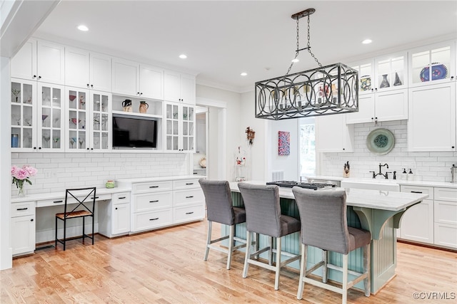 8 Nomas Ln, Henrico, VA 23238 - kitchen featuring tasteful backsplash, white cabinets, light countertops, crown molding, and recessed lighting