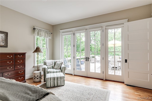 8 Nomas Ln, Henrico, VA 23238 - bedroom featuring access to exterior, light wood-style flooring, and french doors