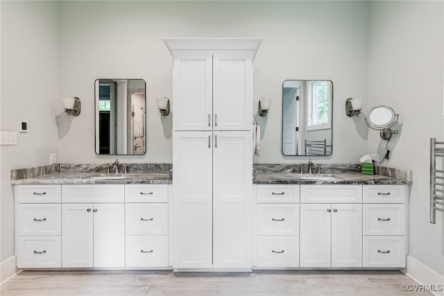 8 Nomas Ln, Henrico, VA 23238 - full bathroom with vanity, wood finished floors, and baseboards