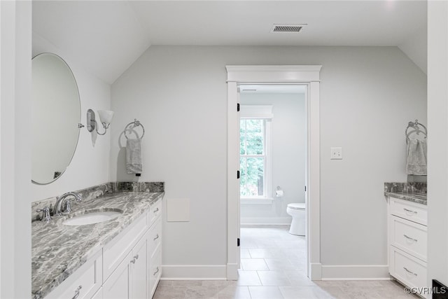 8 Nomas Ln, Henrico, VA 23238 - bathroom with vaulted ceiling, vanity, baseboards, and toilet