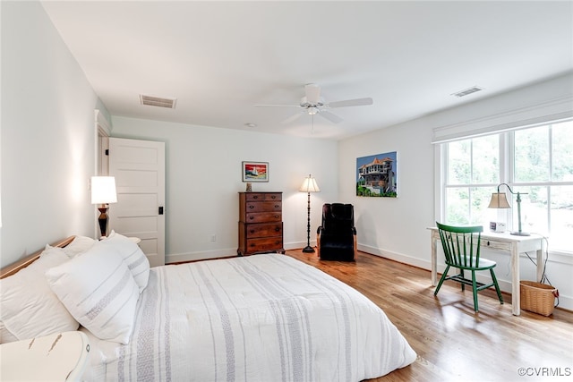 8 Nomas Ln, Henrico, VA 23238 - bedroom with wood finished floors, baseboards, and a ceiling fan