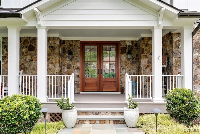 8 Nomas Ln, Henrico, VA 23238 - doorway to property with stone siding, a porch, and french doors