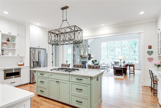 8 Nomas Ln, Henrico, VA 23238 - kitchen featuring green cabinetry, appliances with stainless steel finishes, white cabinetry, light wood finished floors, and crown molding