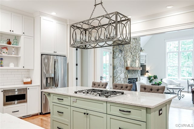 8 Nomas Ln, Henrico, VA 23238 - kitchen featuring green cabinets, stainless steel appliances, light wood-style flooring, light stone counters, and recessed lighting