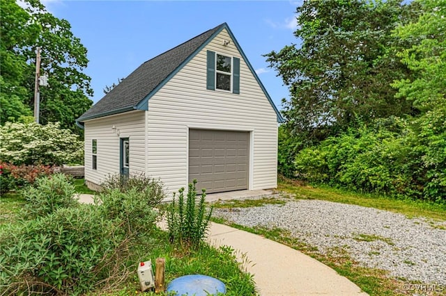 5541 Cedar Ln, Amelia Courthouse, VA 23002 - garage featuring gravel driveway and a garage