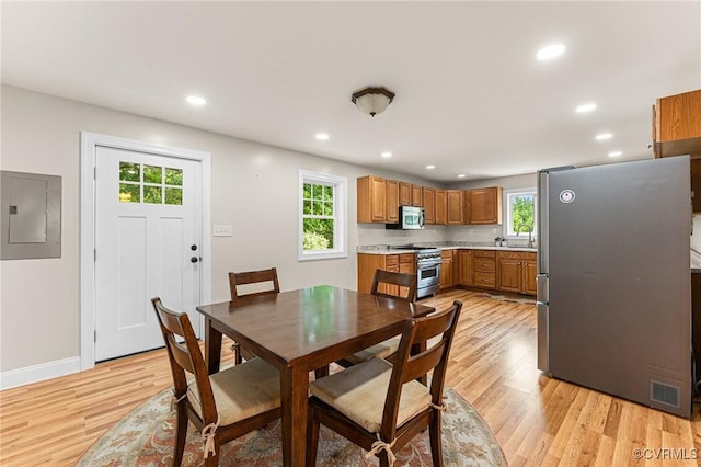 5541 Cedar Ln, Amelia Courthouse, VA 23002 - dining area featuring electric panel, light wood-type flooring, plenty of natural light, and recessed lighting