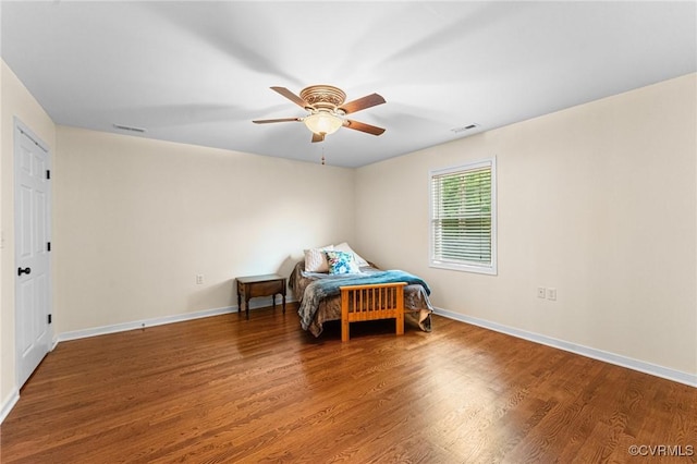5541 Cedar Ln, Amelia Courthouse, VA 23002 - bedroom featuring wood finished floors, baseboards, and a ceiling fan
