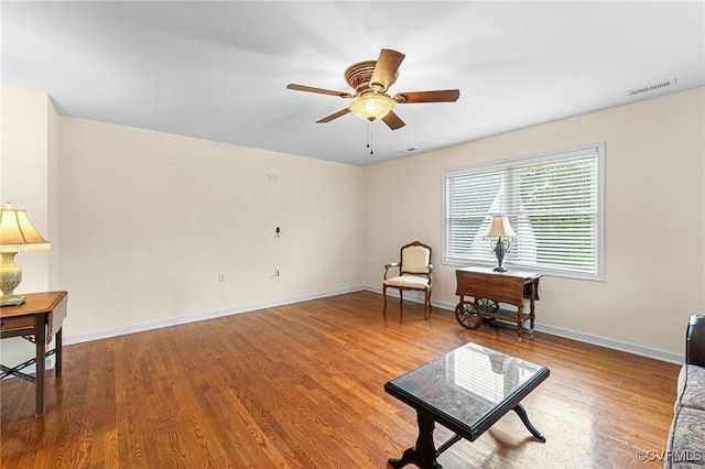 5541 Cedar Ln, Amelia Courthouse, VA 23002 - living area featuring wood finished floors, a ceiling fan, and baseboards