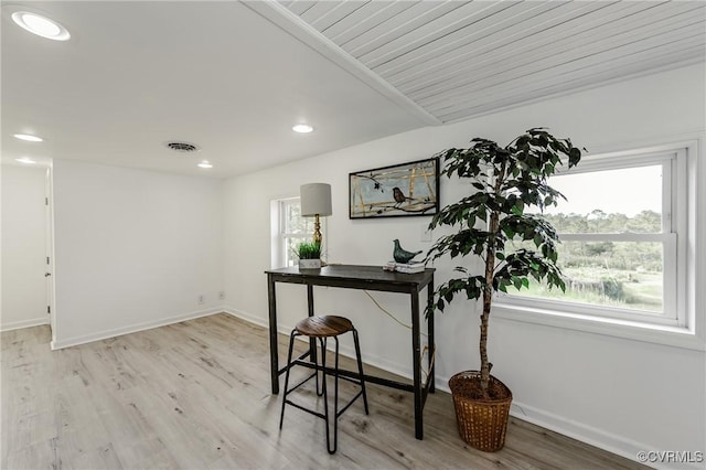 office with light wood-style flooring, baseboards, and recessed lighting