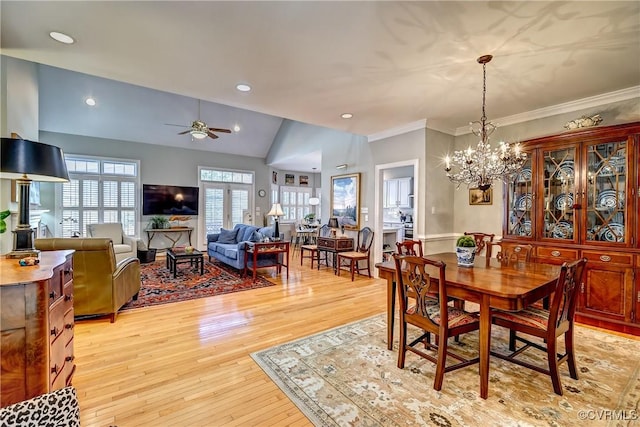 645 Farnham Cir, North Chesterfield, VA 23236 - dining space featuring a chandelier, light wood-style floors, a ceiling fan, ornamental molding, and lofted ceiling