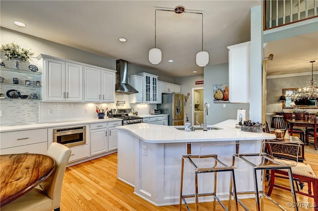 645 Farnham Cir, North Chesterfield, VA 23236 - kitchen with wall chimney exhaust hood, stainless steel appliances, a sink, a peninsula, and white cabinetry