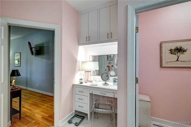 645 Farnham Cir, North Chesterfield, VA 23236 - hallway with light wood-type flooring and baseboards