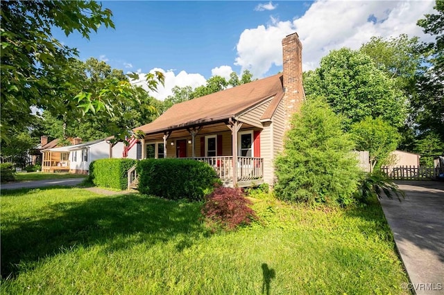 9323 Edington Dr, North Chesterfield, VA 23237 - view of front of home with covered porch and a chimney