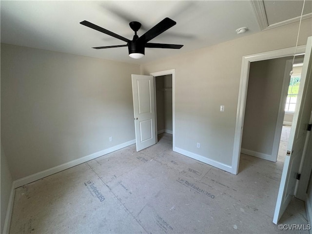17420 Wedgewood Dr, Lanexa, VA 23089 - unfurnished bedroom featuring attic access, baseboards, a walk in closet, a closet, and a ceiling fan
