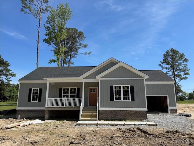 17410 Wedgewood Dr, Lanexa, VA 23089 - view of front of property with covered porch, a garage, and a shingled roof